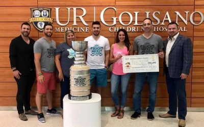 Beach Hockey Classic board presents check to Golisano Children’s Hospital